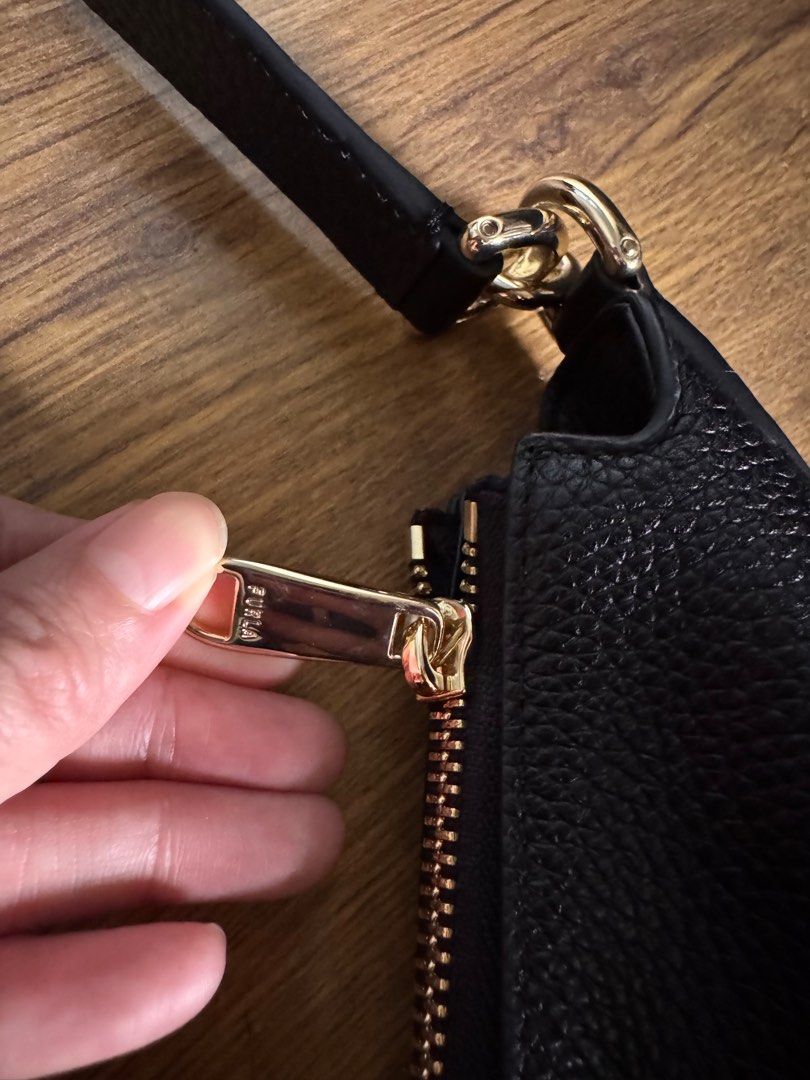 RUSH SALE! Guaranteed Authentic FURLA Bag (Category: Luxury Bags & Wallets) located in Muntinlupa City. Submitted by our_little_closet (Listing ID 1409437676, Image 3). Description: Guaranteed authentic FURLA leather shoulder bag Color: black with gold hardware RFS: decluttering This ba was bought late last year only in FURLA store. It was used once only! Another impulse buy from a trip. It is in like bnew condition. Leather has no flaws and gold