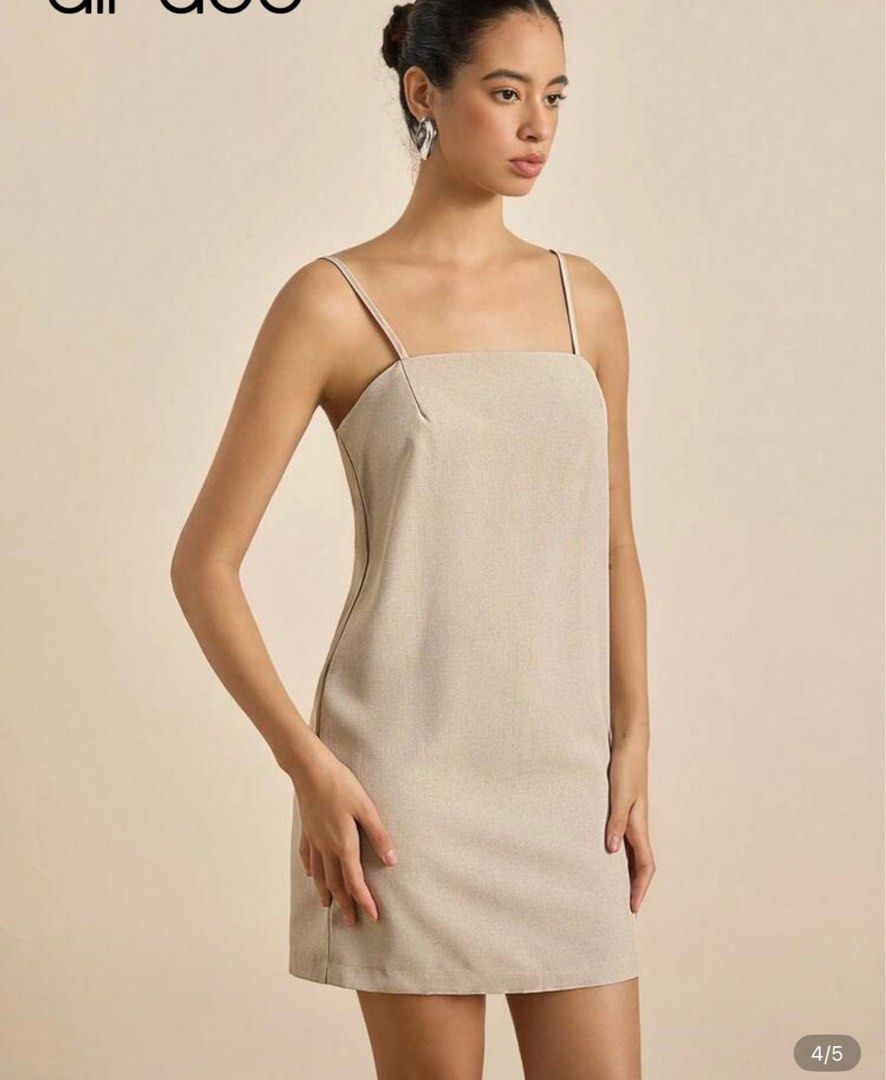 Shein Linen Top - XS (Category: Sleeveless) located in Quezon City. Submitted by declutterrringme (Listing ID 1409497183, Image 3). Description: - Linen top - Size: XS - Design: Thin straps, straight cut - Color: Neutral - Style: Versatile for casual outfits.