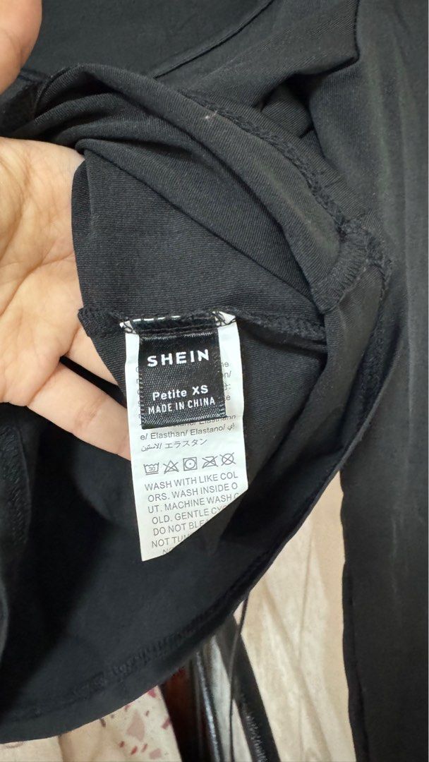 Shein Petite XS Long Sleeve Top (Category: Longsleeves) located in Quezon City. Submitted by declutterrringme (Listing ID 1409498474, Image 2). Description: - Shein black long sleeve top - Size: Petite XS - Features a scoop neckline - Made of stretchy material - Great for layering or wearing on its own - Versatile style.