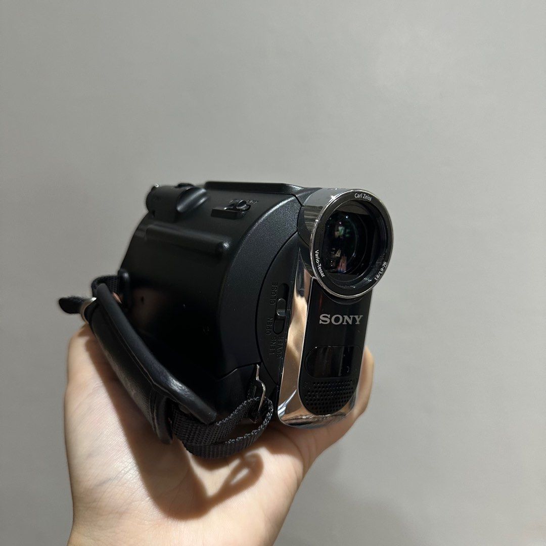 Sony Handycam DCR-HC54 (Category: Video Cameras) located in Manila. Submitted by rheinvg (Listing ID 1409443302, Image 2). Description: Sony Handycam DCR-HC54 with Carl Zeiss lens, 40x optical zoom, and USB streaming. Silver and black color. Includes hand strap. — super old casette video recorder - still boots up - not sure if lcd screen is still working - uses casette, not sd card - mind your expectations ! selling this kesa itapon lang nego for