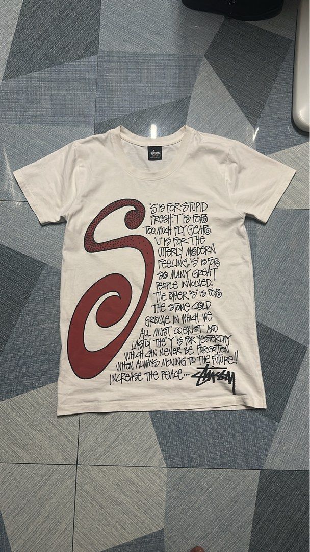 Stussy Graphic Tee - Small Talk (Category: Tshirts & Polo Shirts ) located in Cabanatuan. Submitted by thecatplug (Listing ID 1409609388, Image 1). Description: - Stussy t-shirt (Small Talk) Authentic - Size: Medium -Width: 19-20 -Length: 26 - Unique graphic design with text and stylized "S" - Made in Guatemala - Material: 100% cotton - Includes washing instructions Mop: gcash Willing to negotiate .
