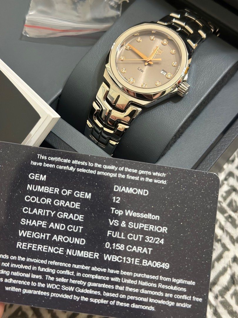 TAG Heuer Link Diamond Watch with receipt (Category: Luxury Watches) located in Quezon City. Submitted by rc_rd (Listing ID 1402205952, Image 3). Description: - TAG Heuer Link watch - Silver dial with diamond hour markers - Stainless steel bracelet - Classic design - Date display at 3 o'clock - Suitable for everyday wear and special occasions.
