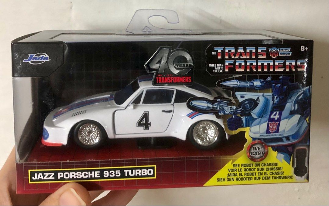 Transformers Jazz Porsche 935 Turbo (Category: Vehicle & Diecast Models) located in Binan City. Submitted by elf.0000 (Listing ID 1409529258, Image 1). Description: P1,000.00 plus shipping cost Sealed but box is not in mint condition 1:32 Payment via gcash Ship thru jnt or lalamove.