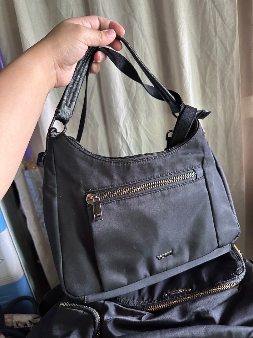 TUMI MIKI CROSSBODY BAG (Category: Shoulder Bags) located in Manila. Submitted by barbzzz (Listing ID 1409574340, Image 2). Description: For airport use only Bought at Tumi Singapore Pls see photos RFS: decluttering.