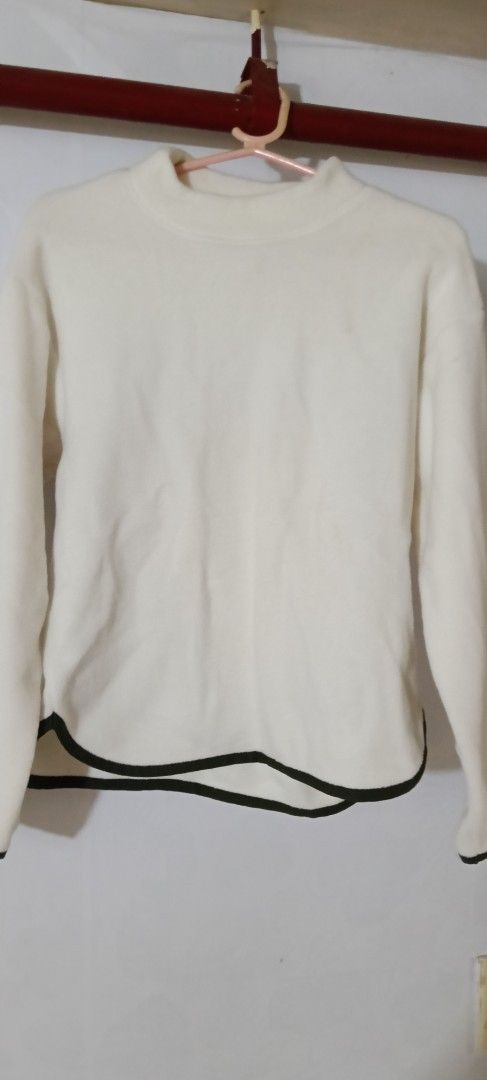 Uniqlo White Mountaineering Sweater (Category: Coats, Jackets and Outerwear) located in Pasig City. Submitted by ani2684 (Listing ID 1409513630, Image 1). Description: - Uniqlo White Mountaineering sweater - Color: White - Features: Mock neck, long sleeves, black trim on hem and cuffs - Size: 150 - Made in Vietnam.