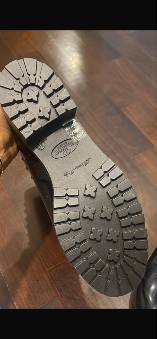 Valentino Rain Boots - Black - EU40 (Category: Boots) located in Singapore. Submitted by rd1234567 (Listing ID 1409600362, Image 1). Description: - Brand new Valentino rain boots - Size: EU40 - Features studded design - Durable sole - Perfect for rainy days - Comes with original tags.