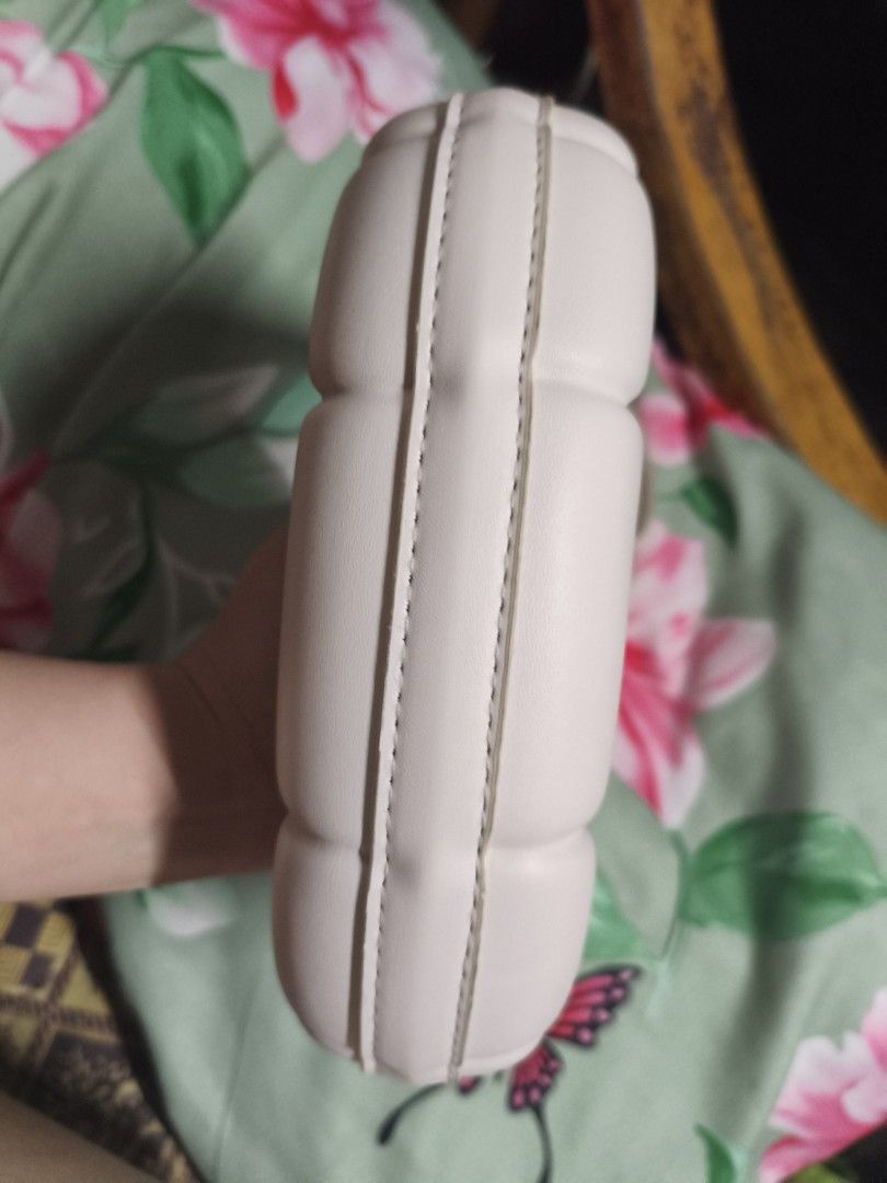 RUSH SALE! White Crescent Shoulder Bag (Category: Shoulder Bags) located in Quezon City. Submitted by cathian (Listing ID 1409534846, Image 3). Description: - Stylish white shoulder bag - Unique crescent shape - Zippered closure - Detachable strap - Red interior lining - small size signs of usage but very minimal.