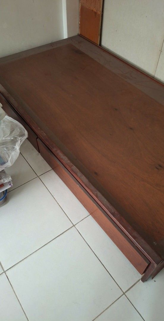 Wooden Underbed Single Pullout bed (Category: Bed Frames & Mattresses) located in Quezon City. Submitted by olx.jodi (Listing ID 1409475156, Image 2). Description: Brand: Singer solid wood. underbed only (single) came from single bed frame rfs: we are using the bed frame.. itong underbed binebenta namin kc masikip na po..hnd kasya kapag nilabas with 2 drawers maalikabok sa pic.. pupunasan na lng kpg kukunin na..