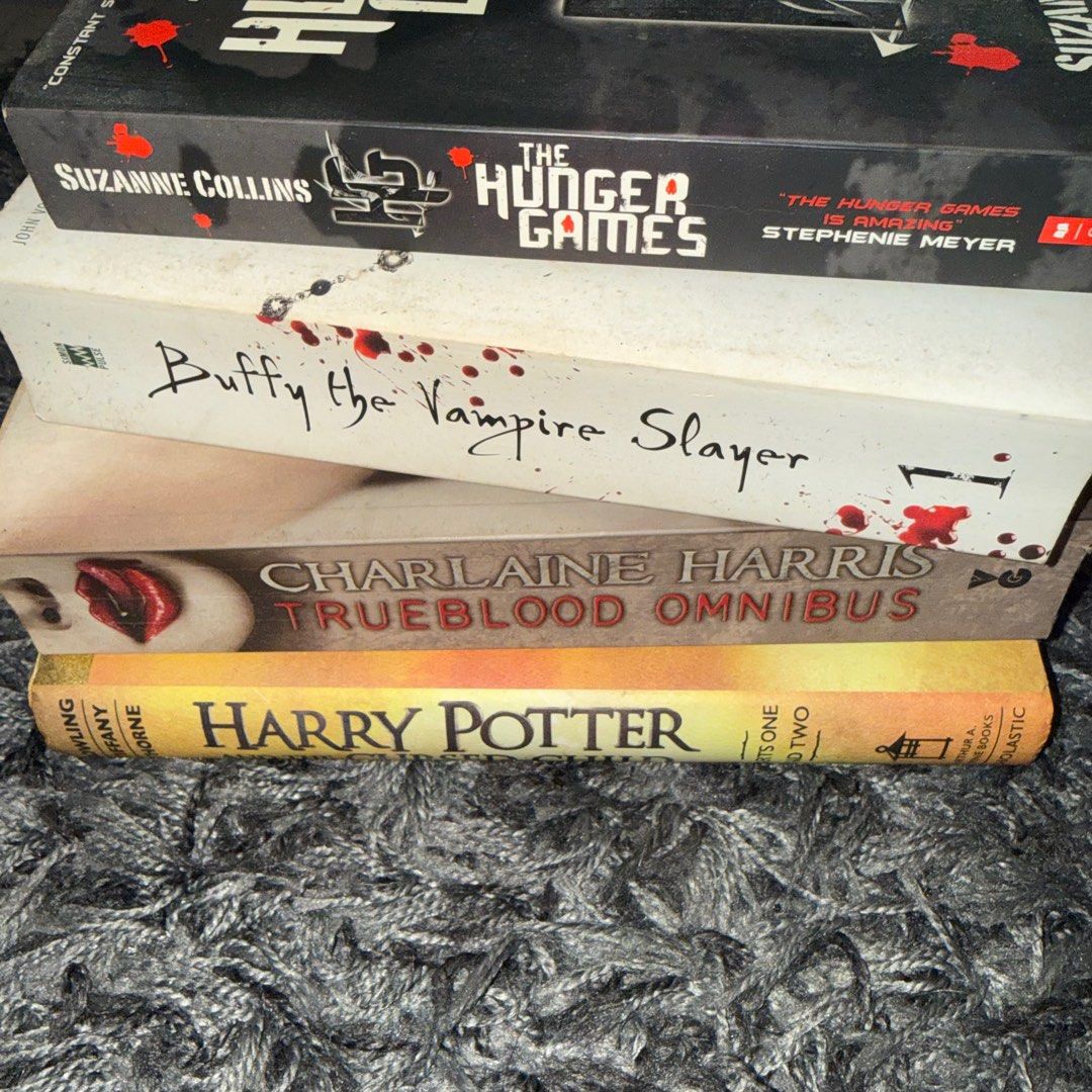 800 for 4! Best-Selling Books (Category: Storybooks) located in San Juan City. Submitted by zacherymartine (Listing ID 1409675864, Image 3). Description: Buy as 800 or 250 each: - Collection includes: "Harry Potter and the Cursed Child," "The Hunger Games," "Buffy the Vampire Slayer," and "True Blood Omnibus." - Titles and authors clearly visible. - Intact spines and covers. - Ideal for fantasy and young adult fiction readers..