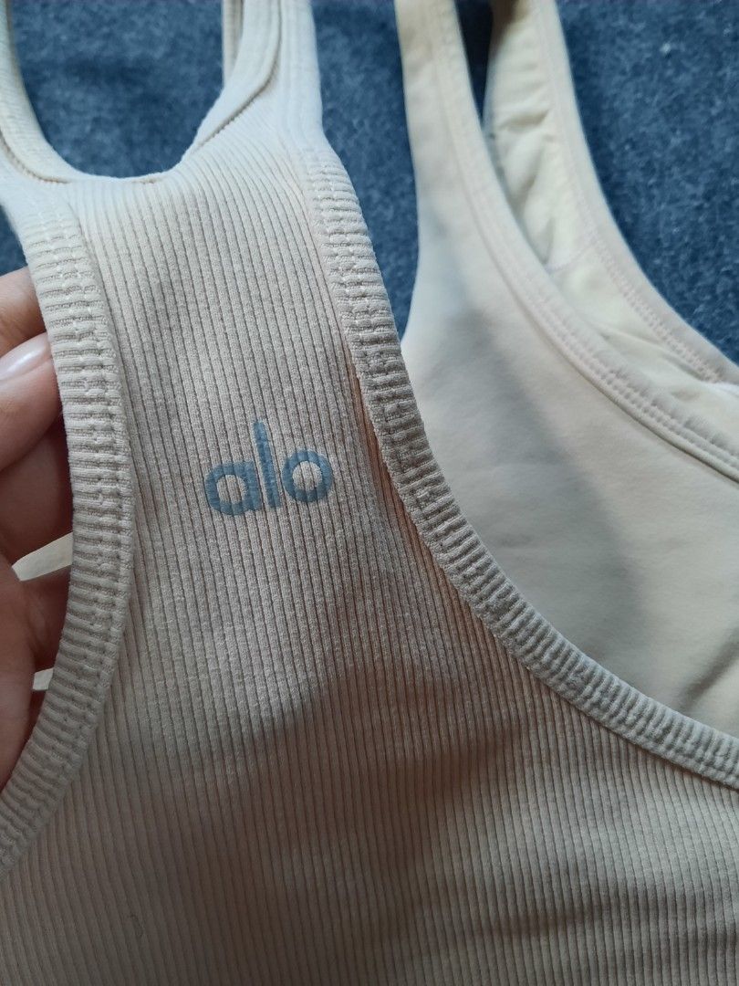 Alo Yoga Trackie Sports Bra long line cage cut out (Category: Activewear) located in San Jose del Monte. Submitted by leslymhey (Listing ID 1409620280, Image 3). Description: - Beige Alo Yoga sports bra - Size: M - Features a unique strappy design - Ribbed detailing - Padded - Comfortable and stretchy fabric - Ideal for yoga, pilates, and workouts.