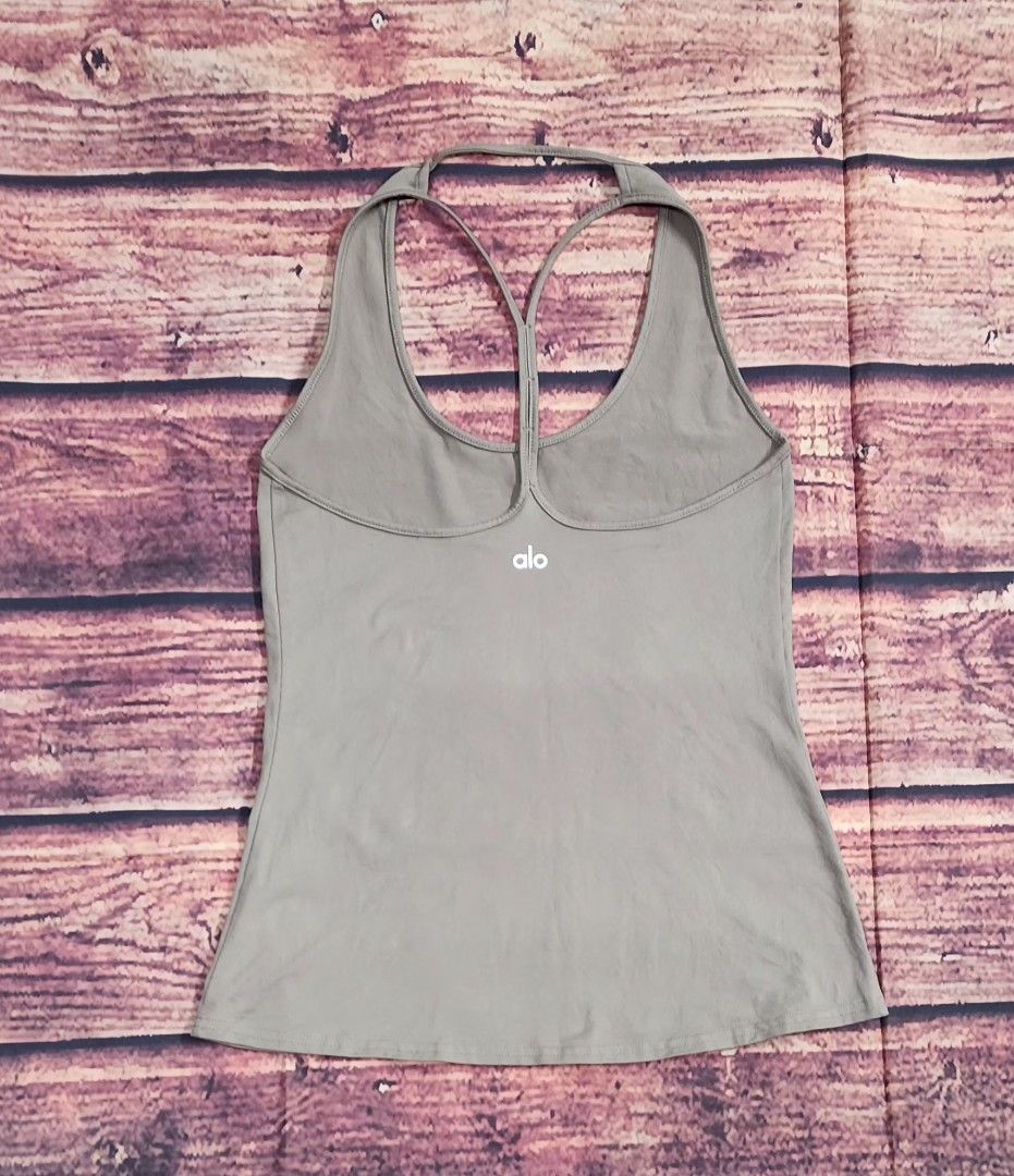 Alo Yoga True Tank (Category: Activewear) located in La Trinidad. Submitted by outfitt (Listing ID 1409790395, Image 3). Description: cut tag; best to fit small to semi medium frame;please check measurement if the fit is right for you slim fit tank airy,strappy open back EXCELLENT USED CONDITION ❌️ NO to LOW ballers.PLEASE.
