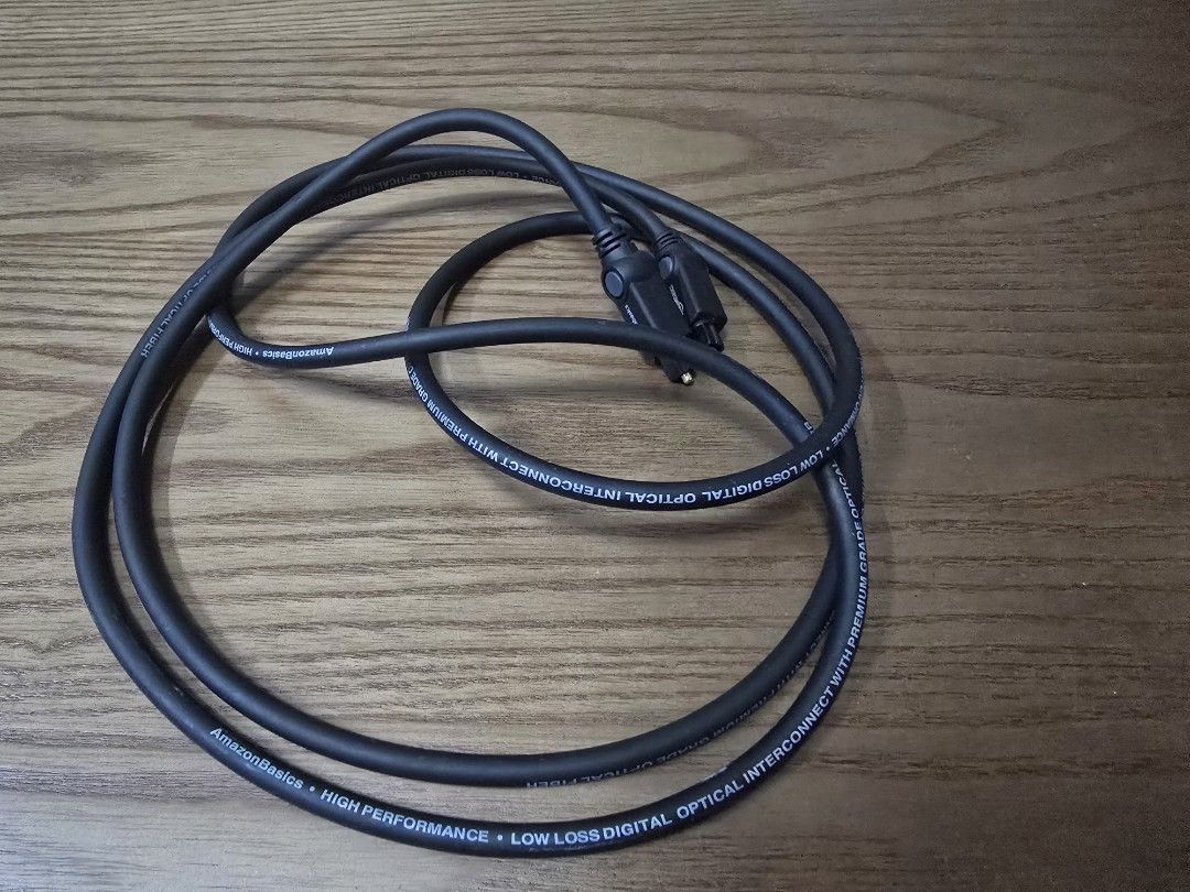 AmazonBasics High-Performance Optical Interconnect Cable (Category: Other Audio Equipment) located in Singapore. Submitted by willy1sg (Listing ID 1409660421, Image 2). Description: - AmazonBasics optical cable - 1.85m long - High-performance for low-loss digital audio - Delivers clear and crisp sound - Black color.