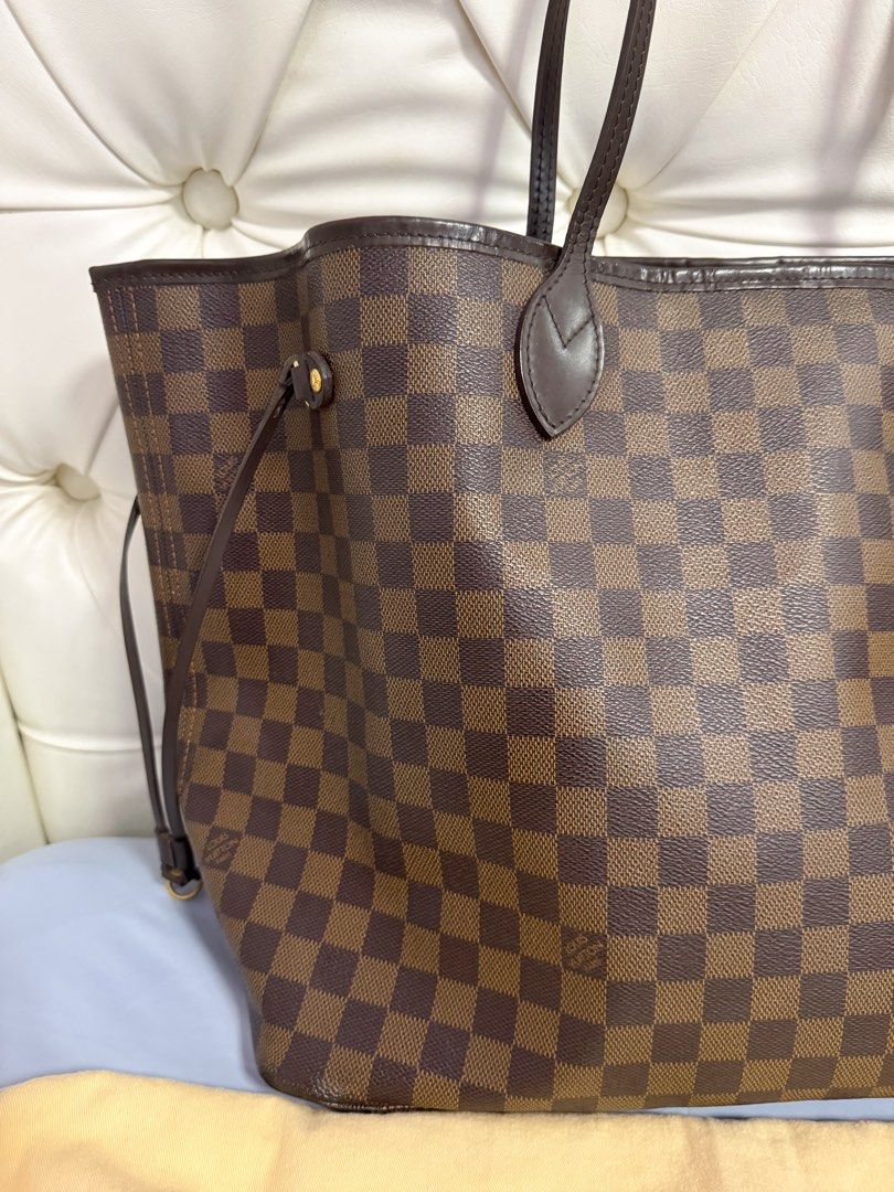 AUTHENTIC LV Neverfull GM in Damier Ebene (Category: Luxury Bags & Wallets) located in Quezon City. Submitted by closetofcoco (Listing ID 1409624987, Image 2). Description: GUARANTEED AUTHENTIC PM FOR INQUIRIES NO LOW BALLING.