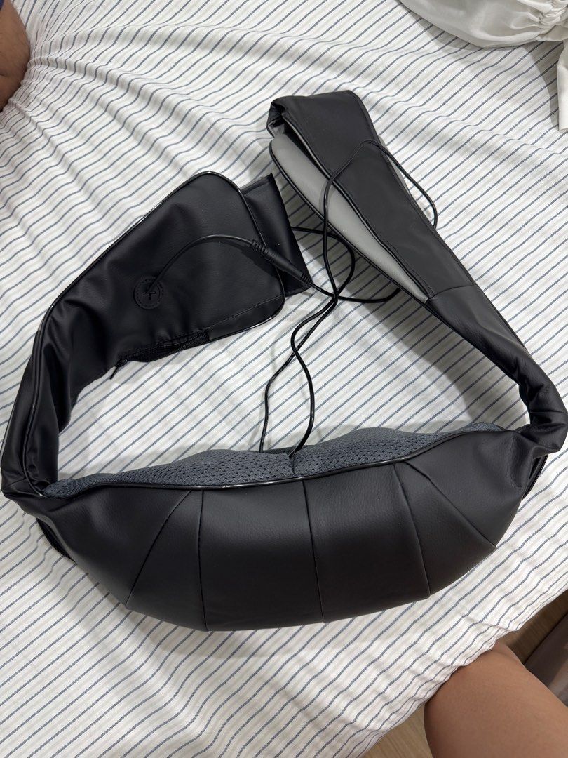 Back, Shoulder, Neck Massager (Category: Massage Devices) located in Quezon City. Submitted by heylouise (Listing ID 1409619750, Image 1). Description: Back, Shoulder & Neck Massager - Black, contoured design. Built-in power cord. Tried once only. Practically brand new Nego for sure buyers.