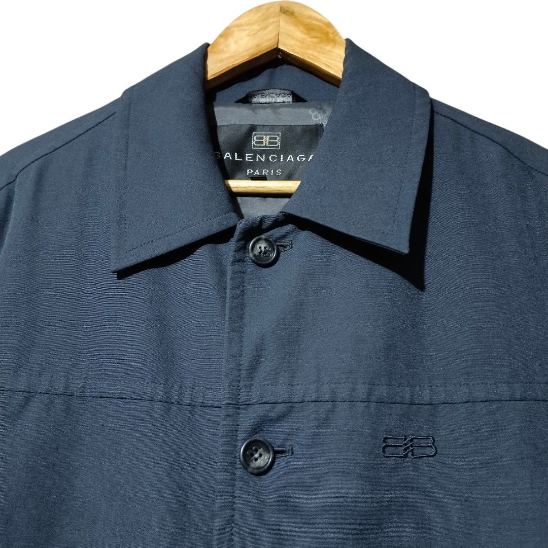 Balenciaga Jacket (Navy Blue) (Category: Coats, Jackets and Outerwear) located in Manila. Submitted by mf.classics (Listing ID 1409745948, Image 2). Description: - Balenciaga Paris navy jacket - Button-down front - Two front pockets - Classic collar - Subtle Balenciaga logo embroidery - Full lining - Tailored fit - Versatile for various occasions - Measurements: 32 L 22 W.