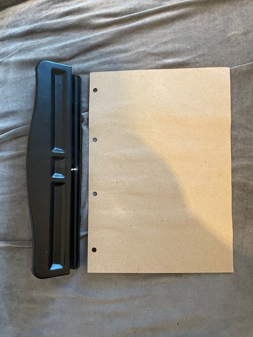 Black Paper Punch (Category: Craft Supplies & Tools) located in Taguig. Submitted by fae99 (Listing ID 1409709702, Image 1). Description: - Black paper punch - In good working condition - Punches holes for binders - Held together with tape - Includes demonstration with paper RFS: Moving out .