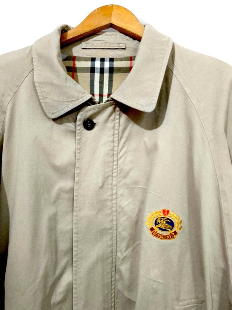 Burberry Harrington Jacket (Beige) (Category: Coats, Jackets and Outerwear) located in Manila. Submitted by mf.classics (Listing ID 1409760963, Image 3). Description: - Authentic Burberrys jacket - Beige color - Iconic Burberry check lining - Button closure - Two front pockets - Made in USA - Classic and timeless style - Measurements: 27 L 23 W.