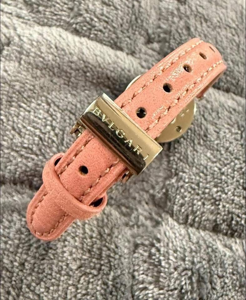 Bvlgari Watch (Category: Luxury Watches) located in Quezon City. Submitted by liezl.marie (Listing ID 1409790768, Image 3). Description: B.zero1 quartz watch with a stainless steel case, a pink mother-of-pearl dial, and a pink leather strap. 28,500 Open for layaway. Disclaimer: We are not affiliated, associated, authorized, endorsed by or in any way officially connected with any other company or luxury brand. All copyrights are reserved to the or