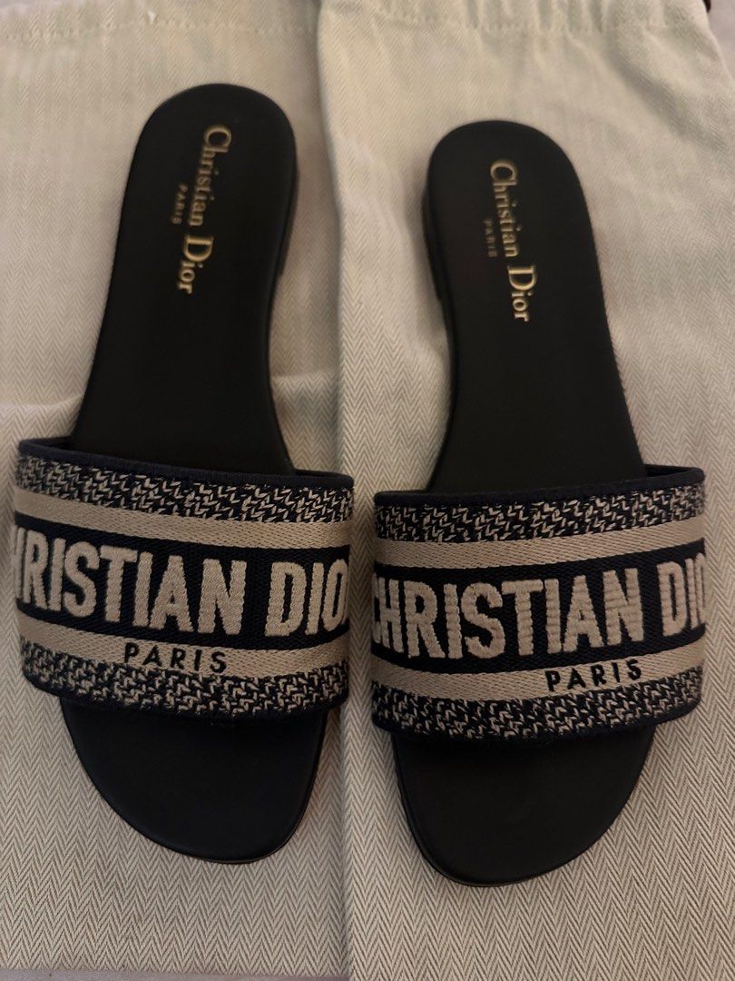 Christian Dior Dway Slides Navy Blue (Category: Slippers and slides) located in Mandaluyong City. Submitted by rae_tt (Listing ID 1409765284, Image 2). Description: AUTHENTIC DIOR DWAY SLIDES NANVY BLUE WORN LESS THAN 10x Rfs: gave birth, doesnt fit me anymore No proof of authenticity, but 100% authentic bought in Paris but no box anymore. .