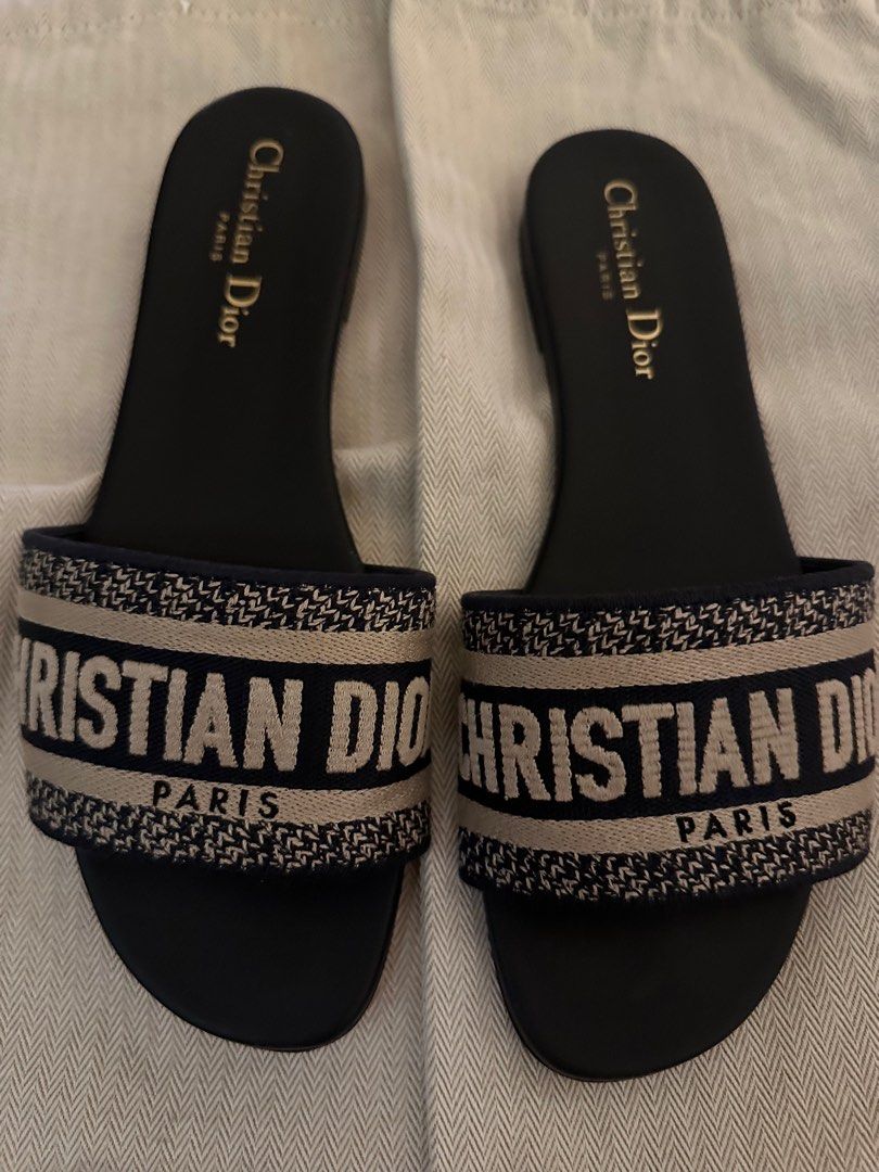 Christian Dior Dway Slides Navy Blue (Category: Slippers and slides) located in Mandaluyong City. Submitted by rae_tt (Listing ID 1409765284, Image 1). Description: AUTHENTIC DIOR DWAY SLIDES NANVY BLUE WORN LESS THAN 10x Rfs: gave birth, doesnt fit me anymore No proof of authenticity, but 100% authentic bought in Paris but no box anymore. .