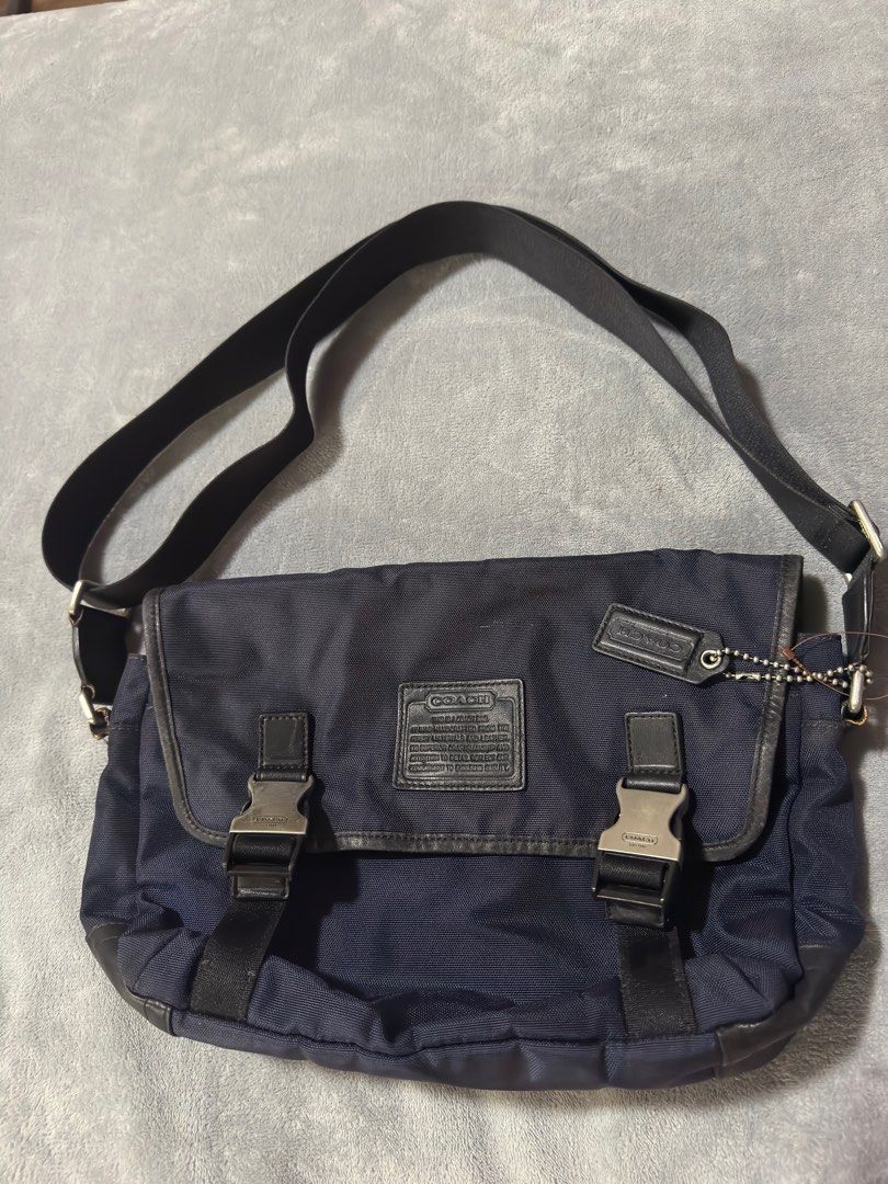 Coach Navy Messenger Bag (Category: Luxury Bags & Wallets) located in Manila. Submitted by dripdistrict (Listing ID 1409630575, Image 1). Description: Issue In the last picture Kayo na bahala pa repair .