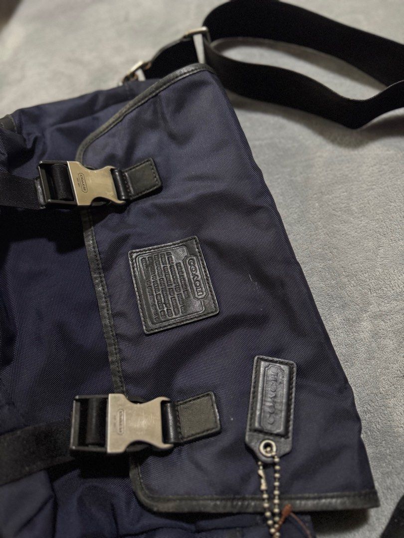 Coach Navy Messenger Bag (Category: Luxury Bags & Wallets) located in Manila. Submitted by dripdistrict (Listing ID 1409630575, Image 2). Description: Issue In the last picture Kayo na bahala pa repair .