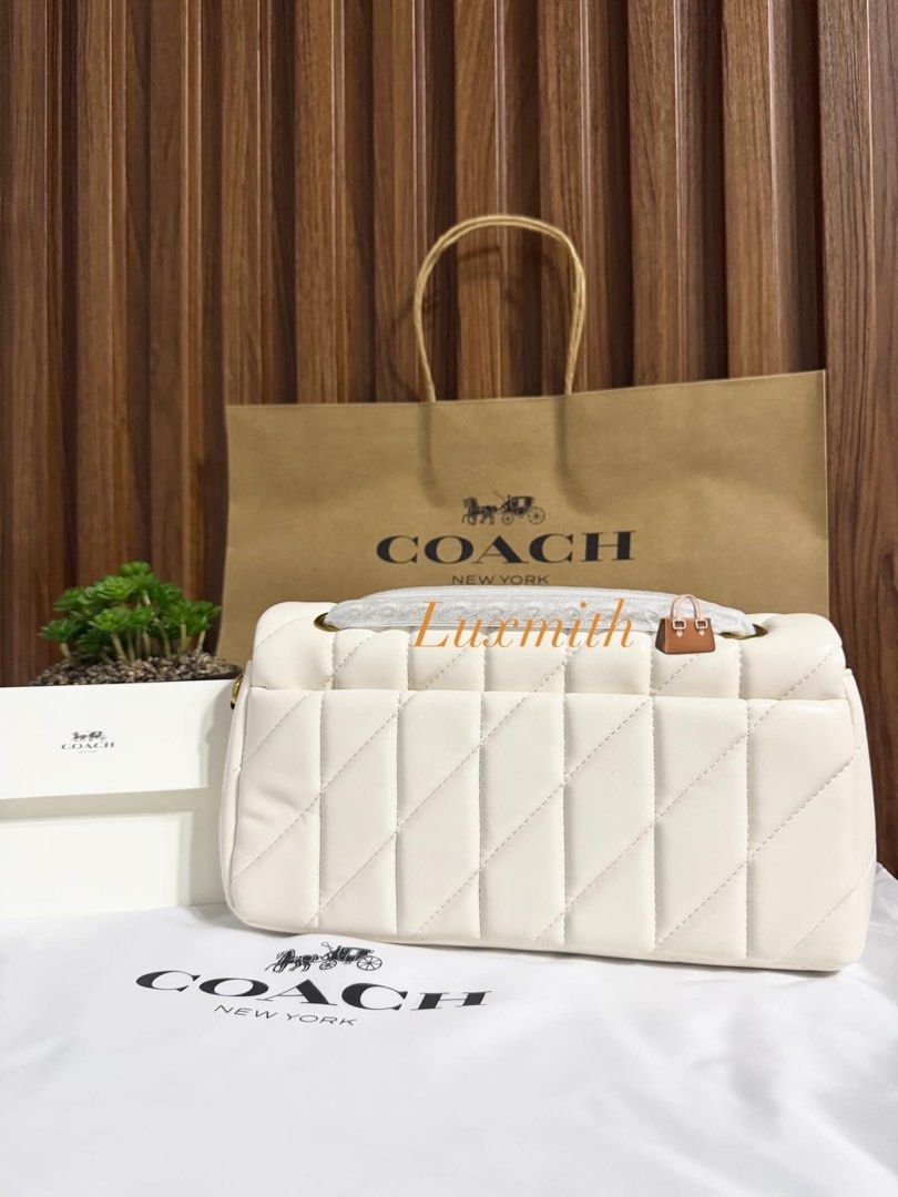 Coach Tabby Shoulder Bag 26 With Quilting white (Category: Luxury Bags & Wallets) located in Manila. Submitted by lux.mith (Listing ID 1409695896, Image 2). Description: SALE! limited stocks. 💯 NOW: 3,500 only + free shipping (before: 4,500) • On hand and ready to ship • No reservation • Confirmed once paid. *ACTUAL PHOTO POSTED* DM TO ORDER DISCLAIMER: Luxmith is not affiliated or associated with any brand posted. No infringement intended. All 
