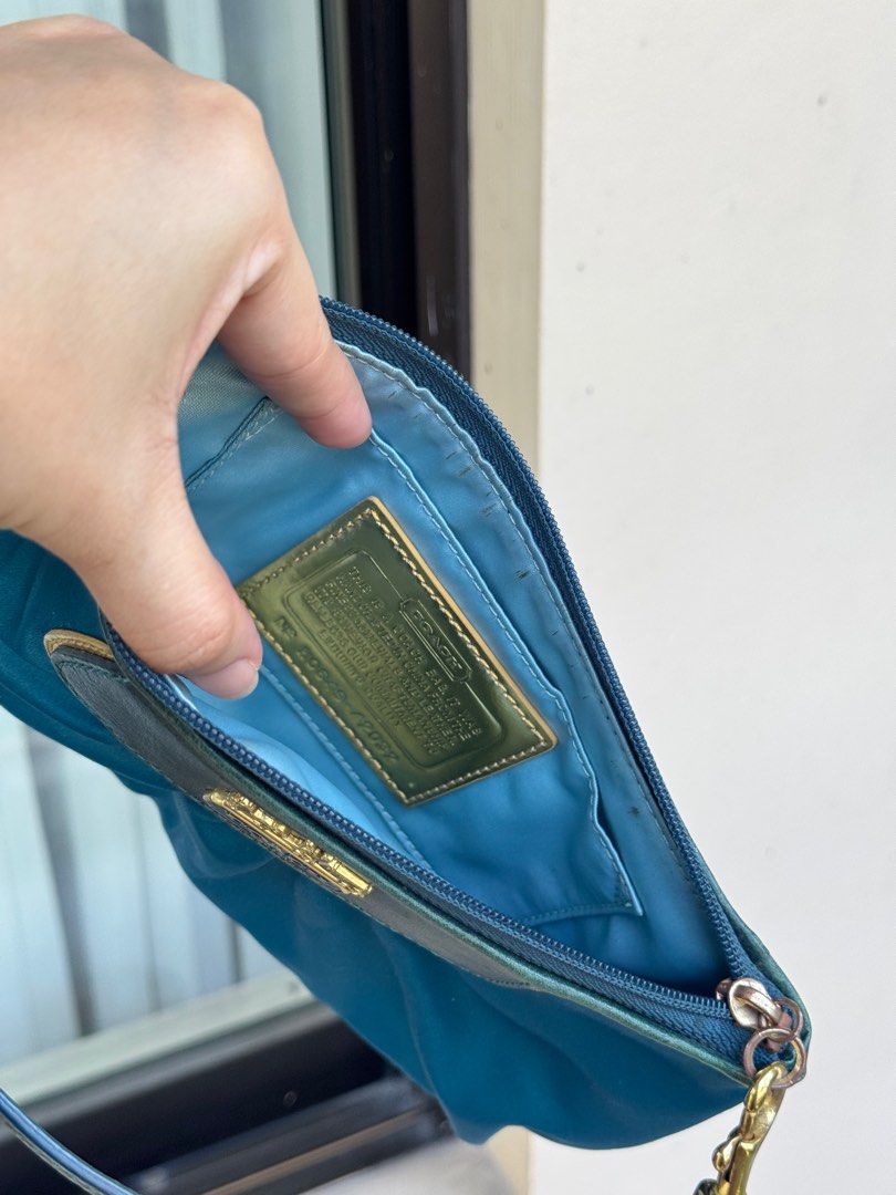 Coach Teal Wristlet (Category: Luxury Bags & Wallets) located in Mandaluyong City. Submitted by salefromcc (Listing ID 1409699897, Image 3). Description: Seconhand bag Bought from japan Small Size 🎉Lowest price you can find (NONNegotiable) 💯 Original with box 🛵Free delivery around mandaluyong 📦other type of delivery are buyers expense NO MEETUP ‼️except around the area/sched No return no refund Buy at your own risk.