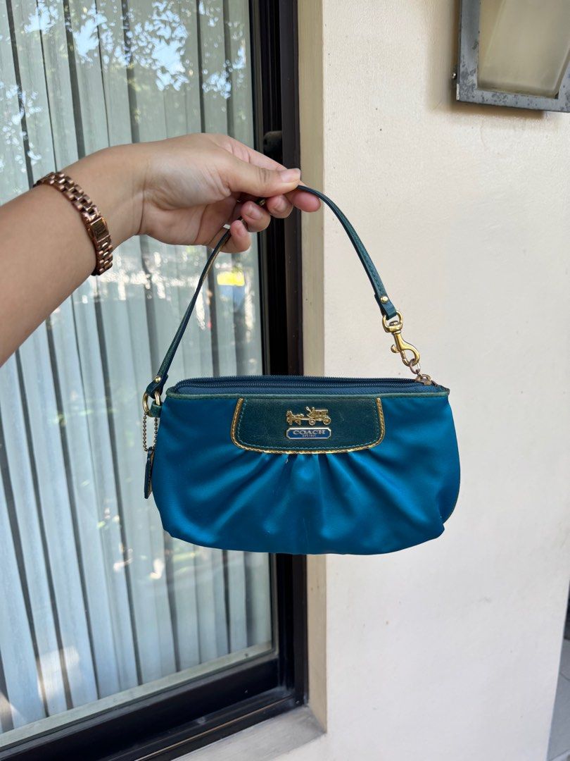 Coach Teal Wristlet (Category: Luxury Bags & Wallets) located in Mandaluyong City. Submitted by salefromcc (Listing ID 1409699897, Image 1). Description: Seconhand bag Bought from japan Small Size 🎉Lowest price you can find (NONNegotiable) 💯 Original with box 🛵Free delivery around mandaluyong 📦other type of delivery are buyers expense NO MEETUP ‼️except around the area/sched No return no refund Buy at your own risk.