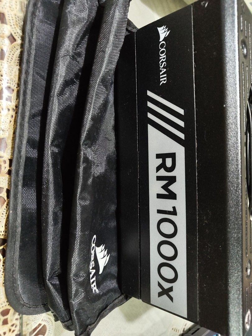 Corsair RM1000x PSU Full Modular (Category: Computer Parts) located in Bacoor. Submitted by xandergreg26531 (Listing ID 1409645061, Image 2). Description: - Corsair RM1000x power supply - Sleek black design with Corsair logo - Includes protective carrying case - Original cables.