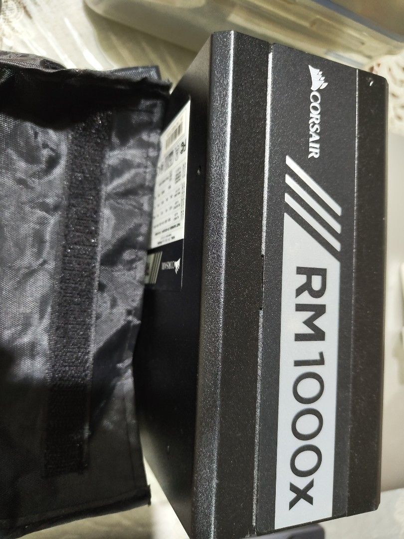 Corsair RM1000x PSU Full Modular (Category: Computer Parts) located in Bacoor. Submitted by xandergreg26531 (Listing ID 1409645061, Image 1). Description: - Corsair RM1000x power supply - Sleek black design with Corsair logo - Includes protective carrying case - Original cables.