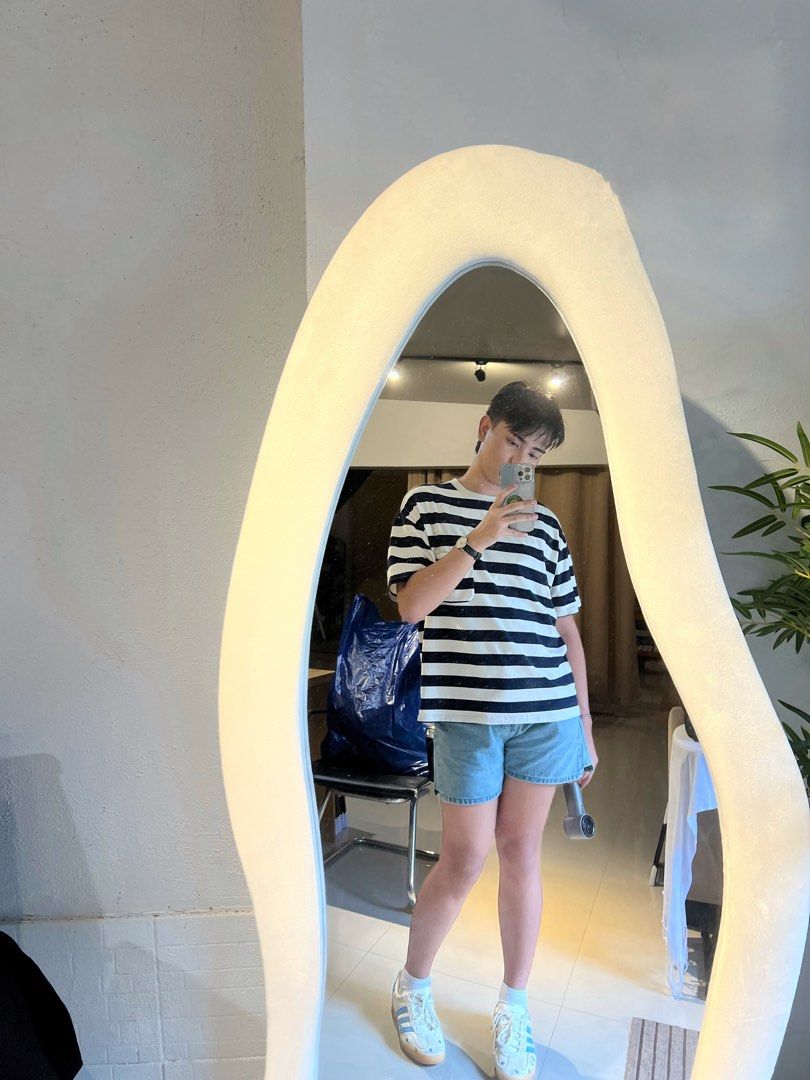 Crewneck Striped T-shirt (Category: Tshirts & Polo Shirts ) located in Makati City. Submitted by i_declutter.mnl (Listing ID 1409700668, Image 3). Description: - Striped cycle t-shirt - Round neckline - Short sleeves - Relaxed fit - Features a pocket - Brand label visible - Ideal for casual wear.
