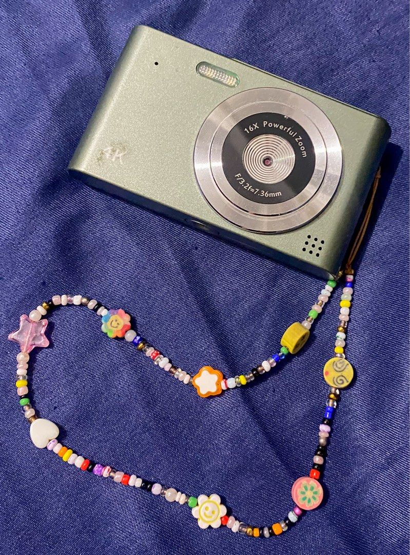 Digital Camera with Beaded Strap (Category: Cameras) located in Manila. Submitted by sctph2024 (Listing ID 1409733722, Image 1). Description: Digital Camera With micro sd card slot No charger included but the charger for this cam is type C. **This item is in Manila.