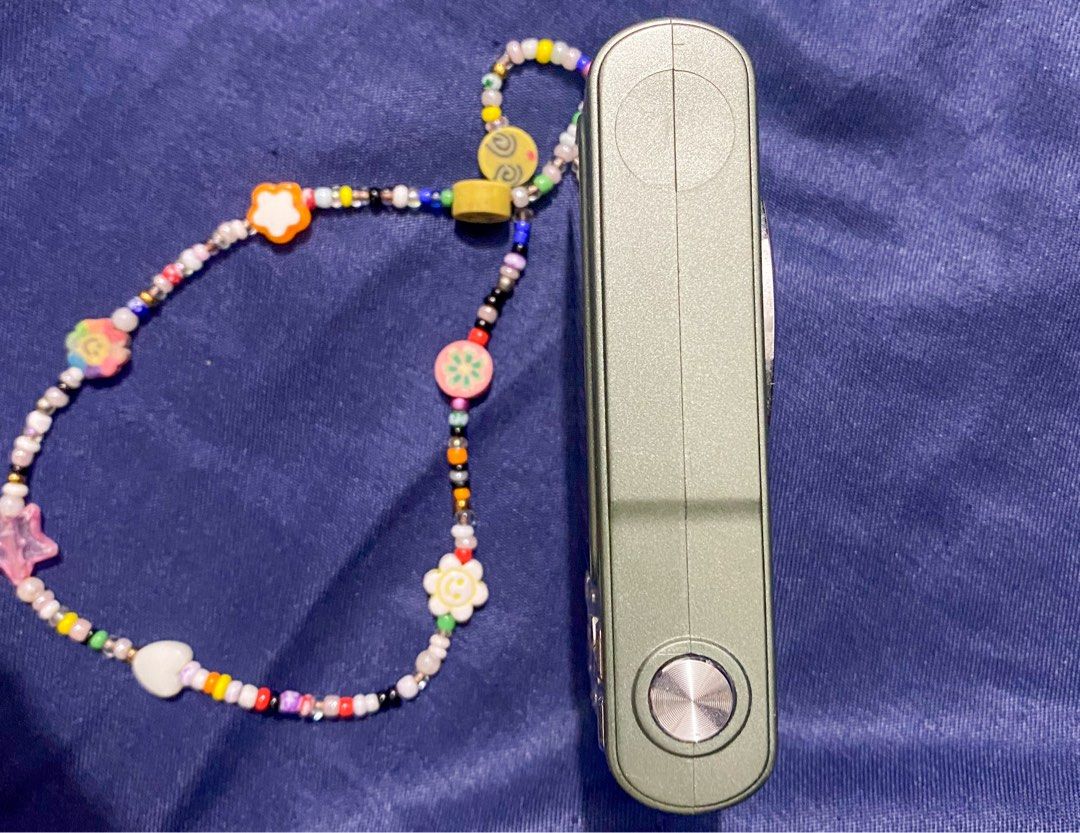 Digital Camera with Beaded Strap (Category: Cameras) located in Manila. Submitted by sctph2024 (Listing ID 1409733722, Image 3). Description: Digital Camera With micro sd card slot No charger included but the charger for this cam is type C. **This item is in Manila.