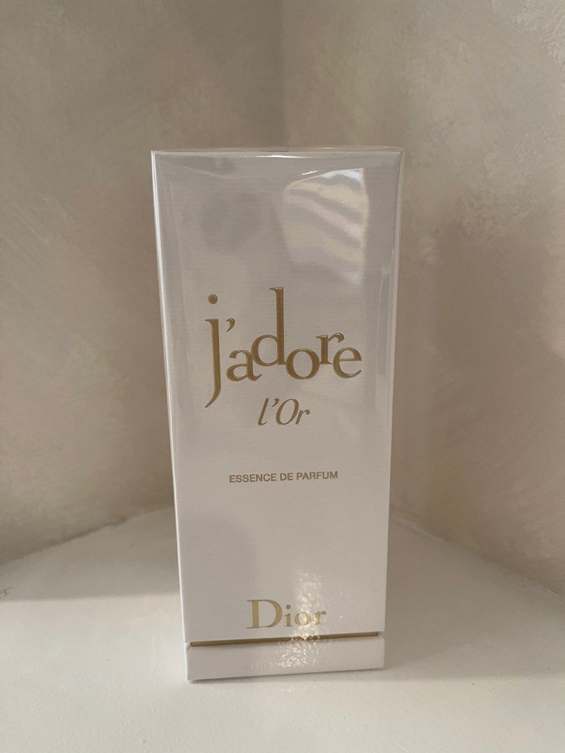 Dior J'adore L'or Essence de Parfum (Category: Fragrance & Deodorants) located in San Juan City. Submitted by declutterrrsale (Listing ID 1409737791, Image 1). Description: - Authentic Dior J'adore L'or Essence de Parfum - New and sealed in original packaging - Sensual floral fragrance - Unique gold-colored bottle design - Gifted and never used; selling below SRP! Store price is P12,100.