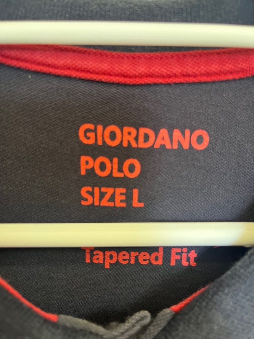 Giordano Polo Shirt - Size L (Category: Tshirts & Polo Shirts ) located in Santa Rosa. Submitted by declutter.jenjen (Listing ID 1409630217, Image 2). Description: - Personal not thrifted -Giordano polo shirt - Color block design: navy, red, and white - Size: L - Features a classic polo collar - Short sleeves - Button-up placket - Tapered fit.