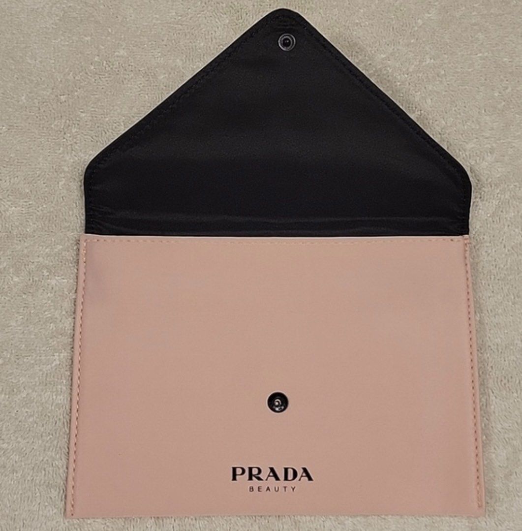 GWP Prada envelope pouch (Category: Luxury Bags & Wallets) located in San Fernando. Submitted by ishi.the.one (Listing ID 1409647258, Image 2). Description: Like new With strap.