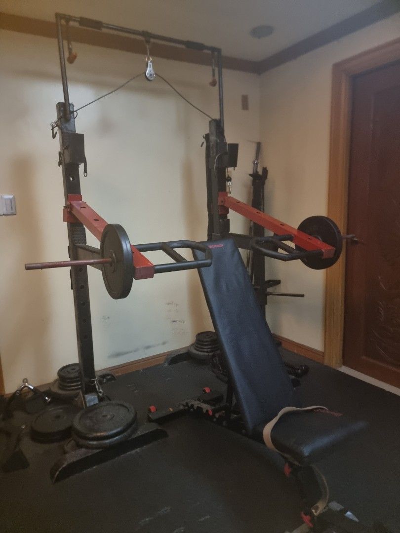 Home Gym Set with Weights (Category: Weights & Dumbbells) located in Pasig City. Submitted by sfork (Listing ID 1409798944, Image 1). Description: Custom made detachable power rack With attachments. Everything included: Belt squat attachment rig Spotter Arms Rack Attachments for Power & Squat J hooks Dip bar attachment Dual bench press attachments 2 pcs 50lb plates 2 pcs 42lb plates 6 pcs 22lb plates 8 pcs 10lb plates 4 pcs 5lb plates Bars: 6tf s