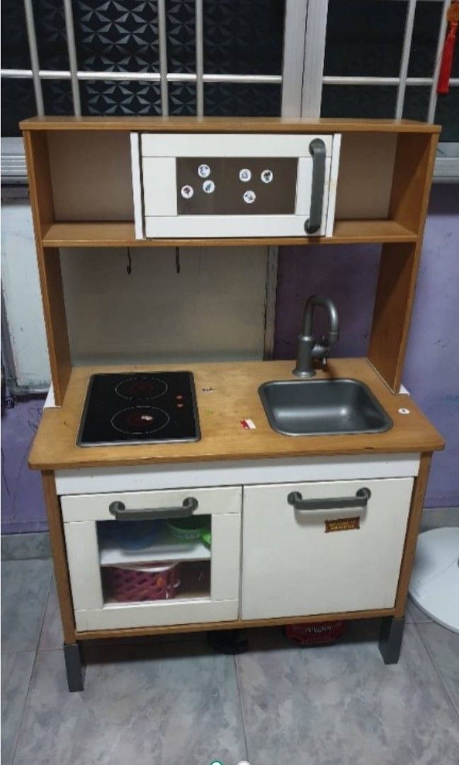 IKEA kitchen set (Category: Kids Toys) located in Singapore. Submitted by junxi_is_a_seller (Listing ID 1409735321, Image 1). Description: IKEA Kitchen Set, used for a few years. Now child all grown up, so don't need already. DM for more info. Nego allowed..