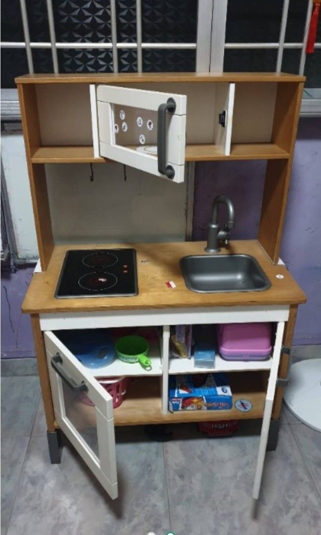 IKEA kitchen set (Category: Kids Toys) located in Singapore. Submitted by junxi_is_a_seller (Listing ID 1409735321, Image 2). Description: IKEA Kitchen Set, used for a few years. Now child all grown up, so don't need already. DM for more info. Nego allowed..
