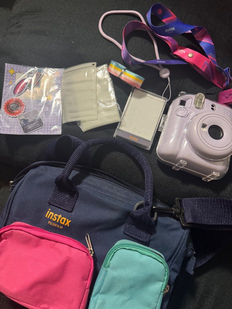 Instax Mini 12 Camera Bundle (Category: Cameras) located in Paranaque City. Submitted by babsdeclutter (Listing ID 1409739179, Image 1). Description: FUJIFILM INSTAX MINI 12 CITY POP PACKAGE (Purple) INSTANT CAMERA - No Film included but with camera cover.