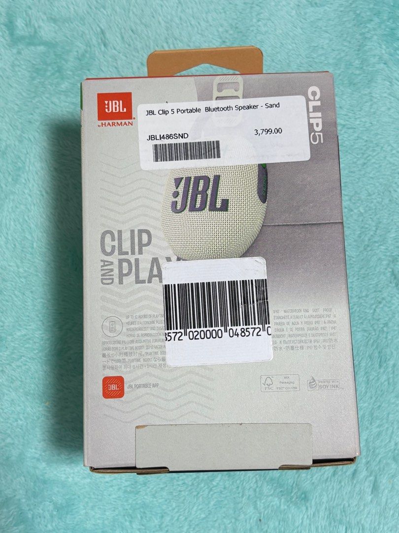 JBL Clip 5 Portable Bluetooth Speaker - Sand (Category: Soundbars, Speakers & Amplifiers) located in Muntinlupa City. Submitted by randomstuffph (Listing ID 1409628280, Image 2). Description: - JBL Clip 5 in Sand - Portable Bluetooth speaker - Bluetooth v5.3 - 12-hour battery life - Built-in carabiner for easy portability - Compact and stylish design.
