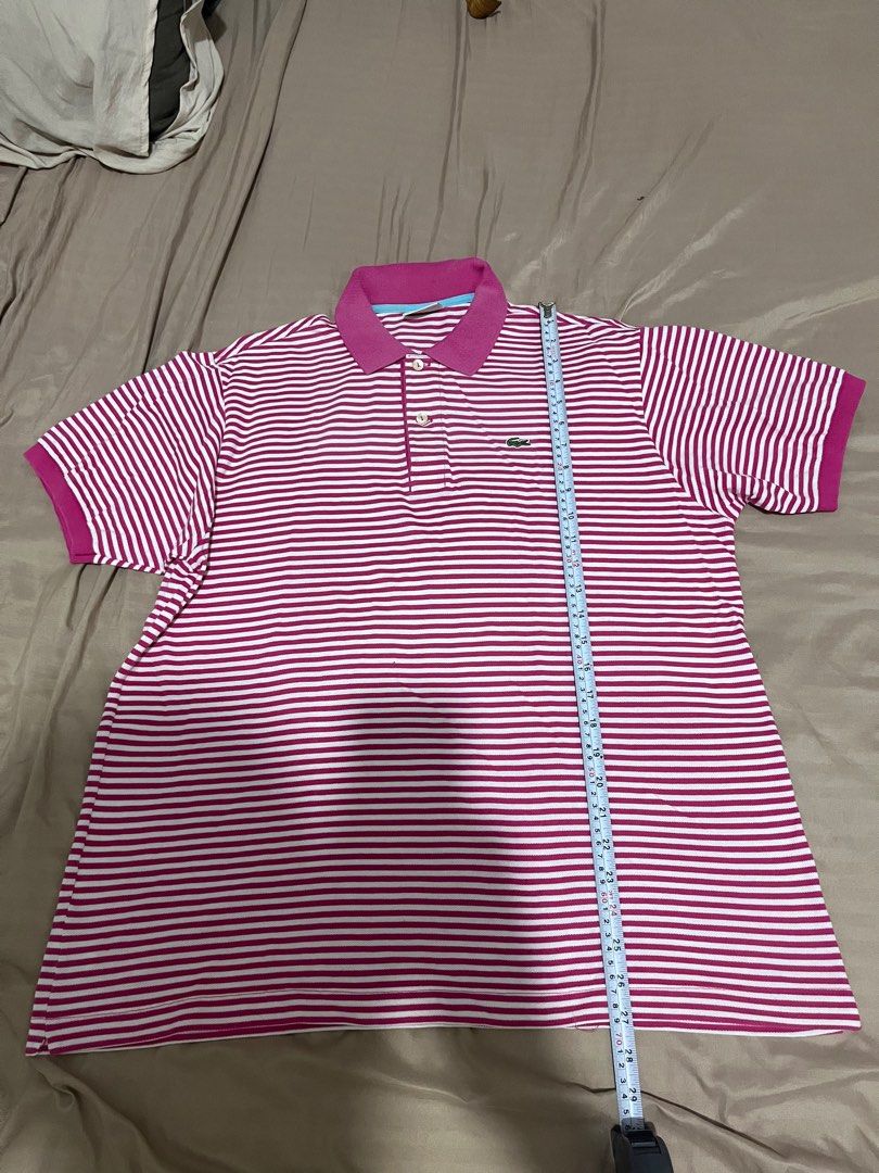 Lacoste pink stripes polo shirt (Category: Tshirts & Polo Shirts ) located in Manila. Submitted by choqee21 (Listing ID 1409763545, Image 2). Description: Lacoste polo shirt size 6 dimes and condition on the picture. Goods na goods pa .