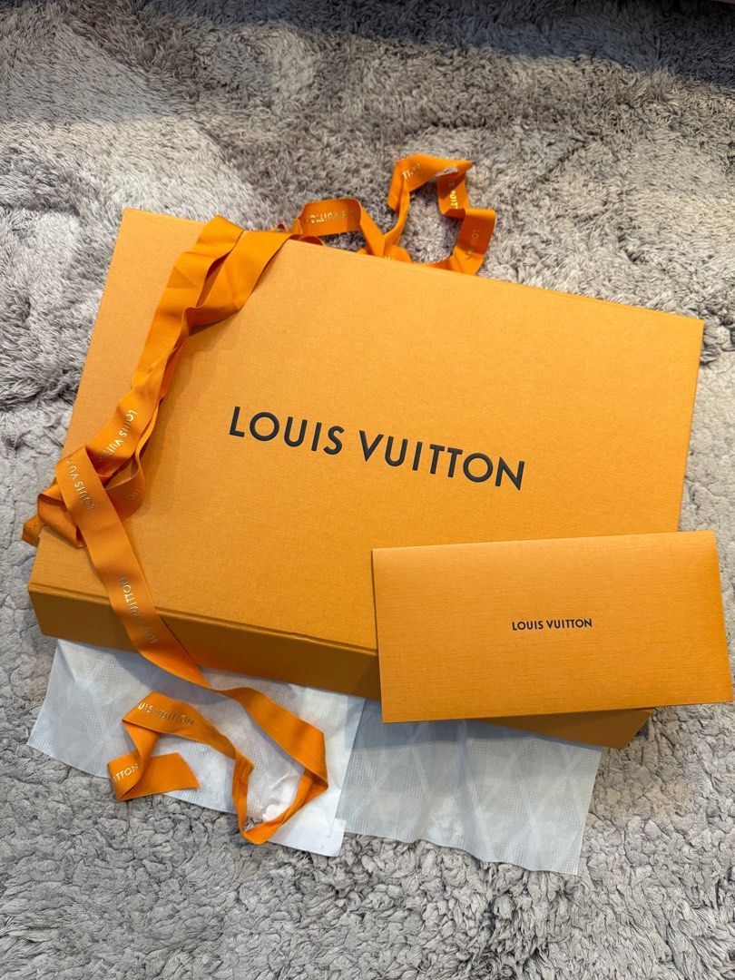 Louis Vuitton Box with Ribbon card (Category: Luxury Bags & Wallets) located in Manila. Submitted by hotdealsph (Listing ID 1409696571, Image 1). Description: - Authentic Louis Vuitton box - Includes original ribbon and envelope - Comes in original packaging - Ideal for gifting or storage.