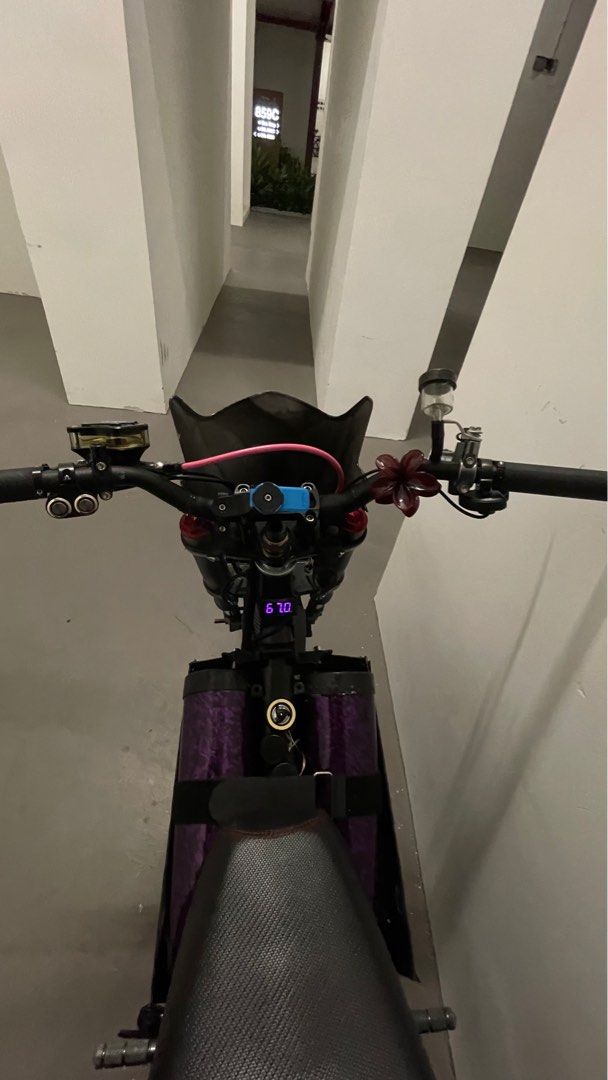 m3 setup (Category: E-Scooters & E-Bikes) located in Singapore. Submitted by zzstoic (Listing ID 1409764238, Image 5). Description: 72450 Fardriver 4.5kw v4 qs changed the front light to 6bulb all purple parts are wrapped by myself what u see is what u get zipties all changed to black everything +chop working just maybe need to make the box neater 👍🏽 PM ME I WONT BITE ! RFS : some cb stole my batt hence decide to sell and quit + need funds for 