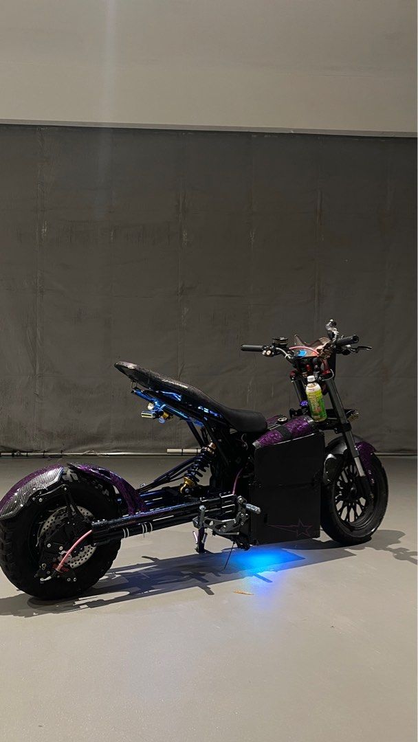 m3 setup (Category: E-Scooters & E-Bikes) located in Singapore. Submitted by zzstoic (Listing ID 1409764238, Image 1). Description: 72450 Fardriver 4.5kw v4 qs changed the front light to 6bulb all purple parts are wrapped by myself what u see is what u get zipties all changed to black everything +chop working just maybe need to make the box neater 👍🏽 PM ME I WONT BITE ! RFS : some cb stole my batt hence decide to sell and quit + need funds for 
