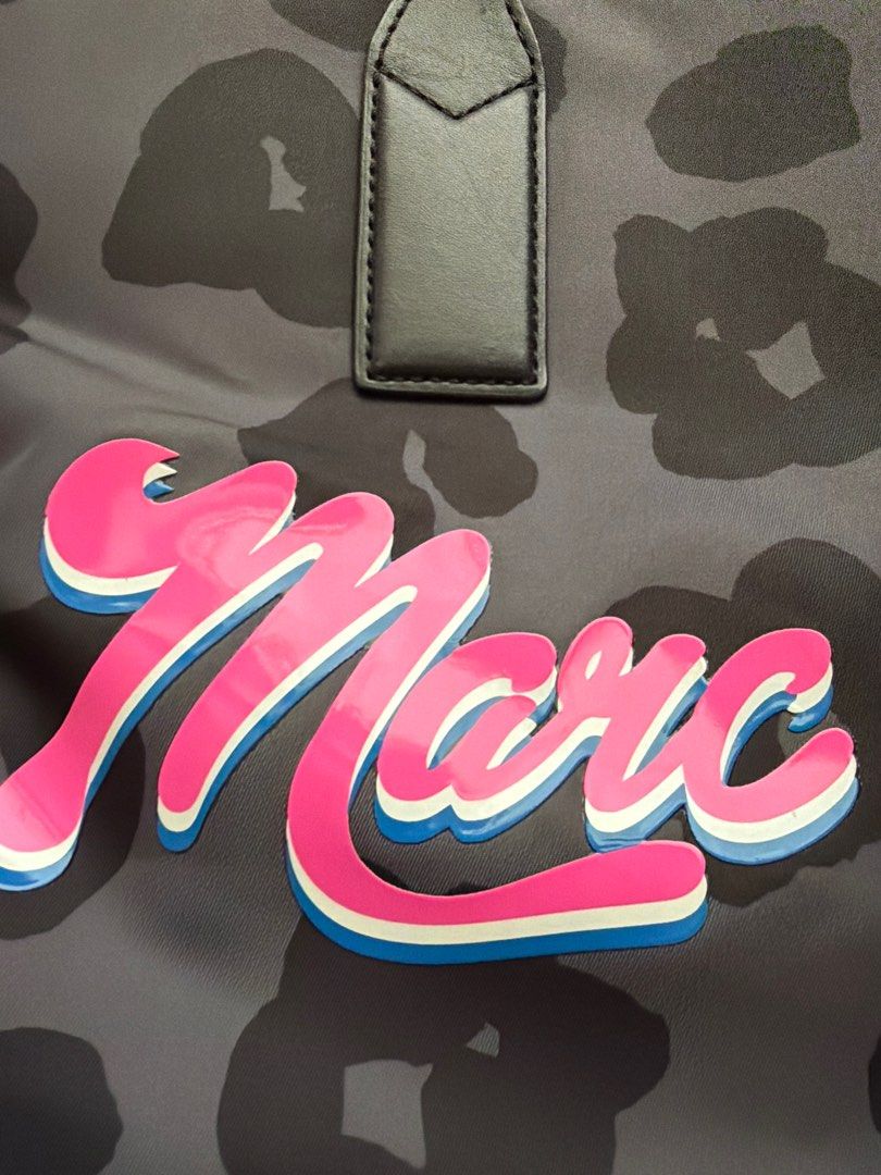 🇺🇸Authentic Marc Jacobs Leopard Print Tote Bag (Category: Luxury Bags & Wallets) located in Caloocan City. Submitted by goldenoona_ (Listing ID 1409671422, Image 2). Description: - Marc Jacobs leopard print tote bag - Zip closure - Interior pocket - Black handles - Marc Jacobs New York label inside - Model: M0014219 002 - Minor wear on handles, chippings due to storage but bag is in good condition 🌼DO NOT MAKE AN OFFER UNLESS SURE NA BUYER. Ba