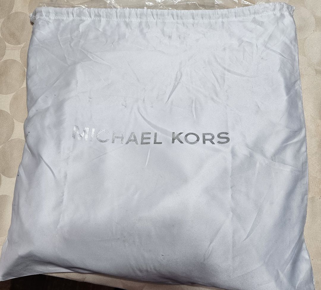 Michael Kors Aria Pebbled Leather Shoulder Bag (Category: Luxury Bags & Wallets) located in Makati City. Submitted by KuWeLaDevil01 (Listing ID 1409642820, Image 2). Description: All Authentic set with original zippers, dust bag (can be washed), trim and the all-important MK Key chain and insignia. The key chain has no nicks and is still shiny as ever, they do not show any visible scratches. Pebbled leather that is rugged but feels very nice to b