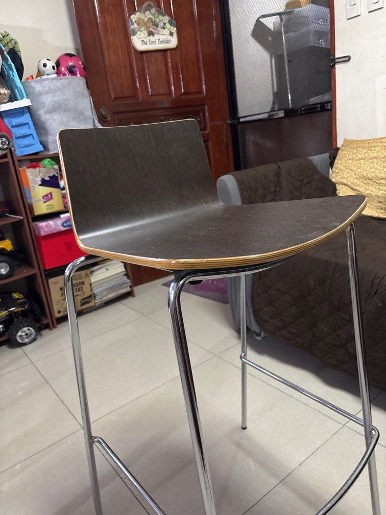 Modern Bar Stool/High Chair with Chrome Legs (Category: Chairs) located in Quezon City. Submitted by jaedenry0228 (Listing ID 1409686237, Image 3). Description: - Dark brown seat and backrest - Sleek design with chrome-finished metal frame - Includes a footrest - Curved seat for comfortable seating - Perfect for kitchen counters or home bars - 2pcs available - 4k for both.