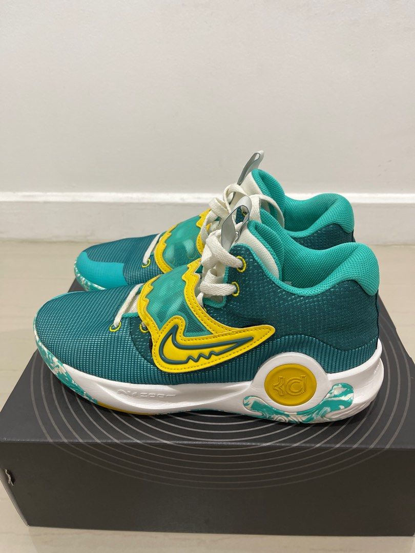 Nike KD Trey 5 X EP (Category: Sneakers) located in Cavite. Submitted by sjlav (Listing ID 1409778757, Image 1). Description: Nike KD Trey 5 X EP sneakers in teal and yellow. Mid-top design with midfoot strap. Size US 9. Includes box. Used few times only. Very good condition..